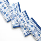 Set of blue and white patterned napkins on a white background