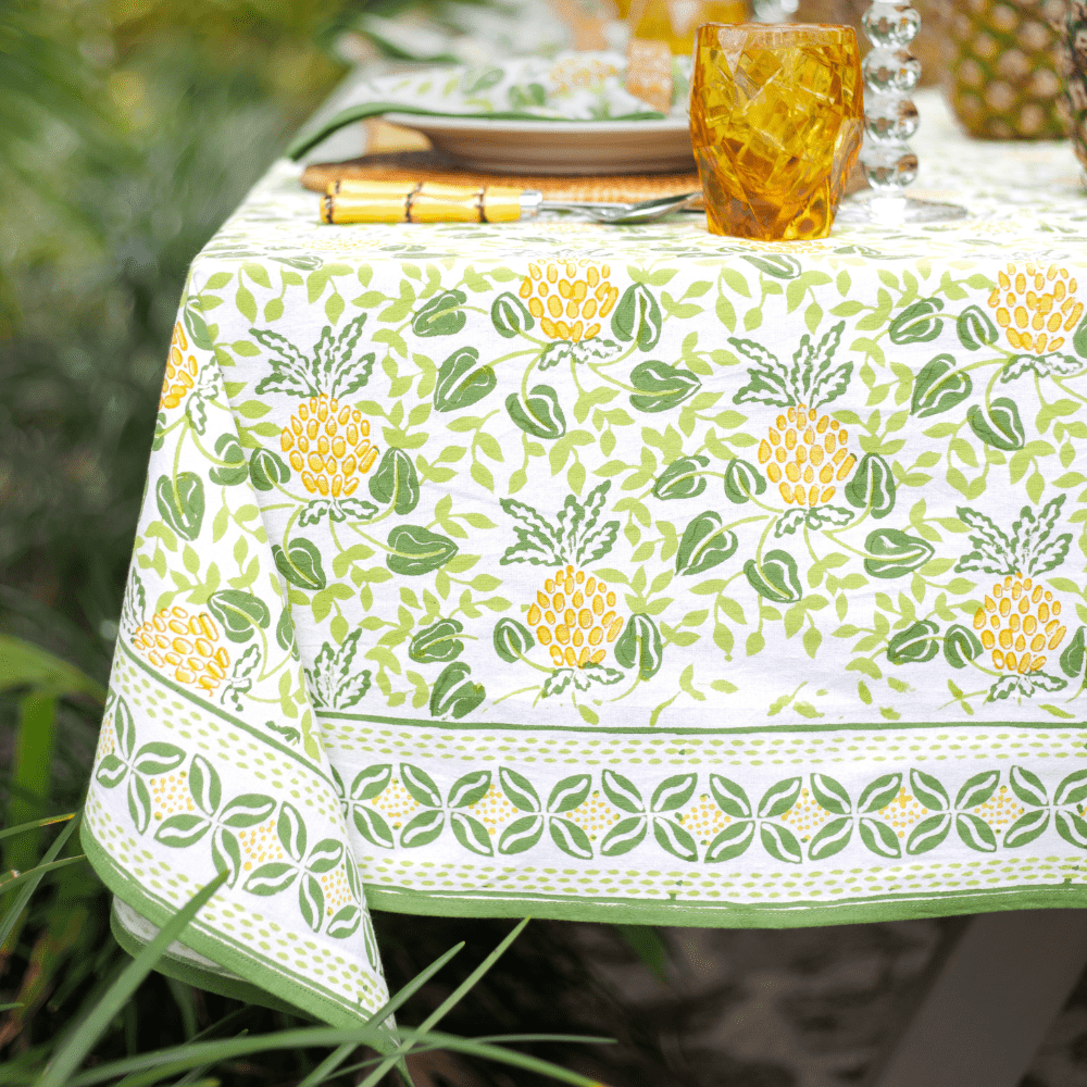 Tablecloth with pineapple pattern on a table outdoors