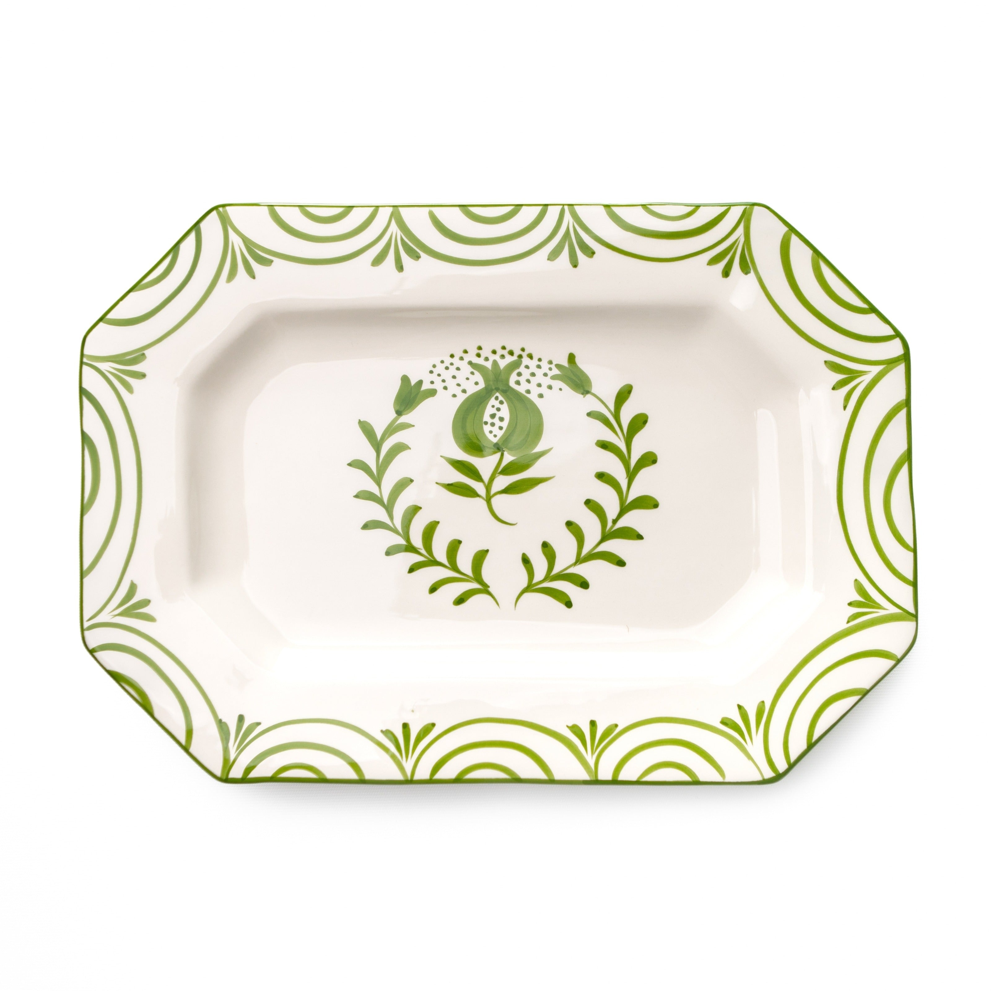 Rectangular platter with green floral patterns on a white background