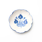 Decorative bowl with cobalt blue floral design on a white background