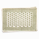 Green patterned placemat on a white background
