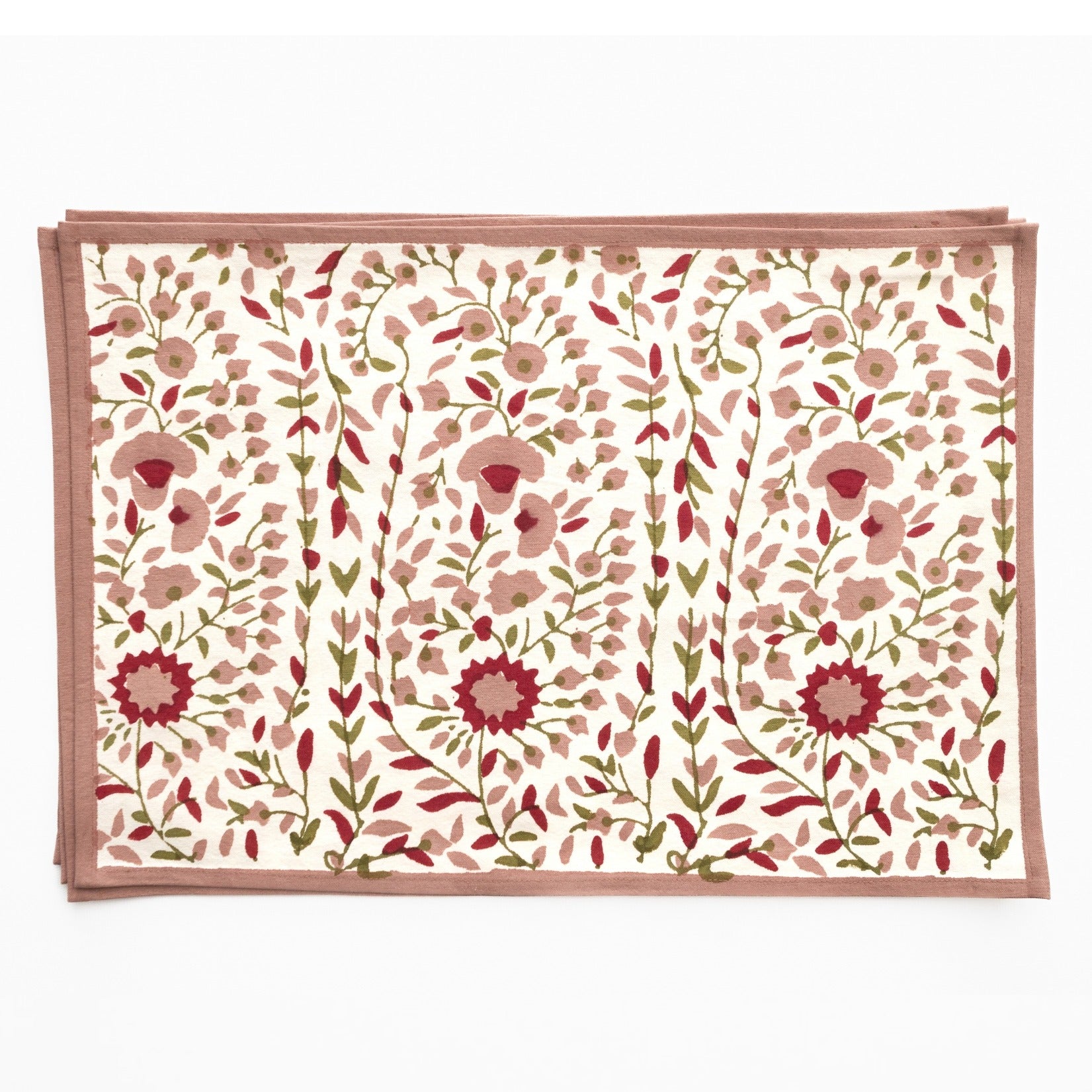 Floral patterned placemat with pink and red flowers on a white background