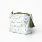 Patterned pouch with green accents on a white background