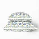 Floral patterned pillows on a white background