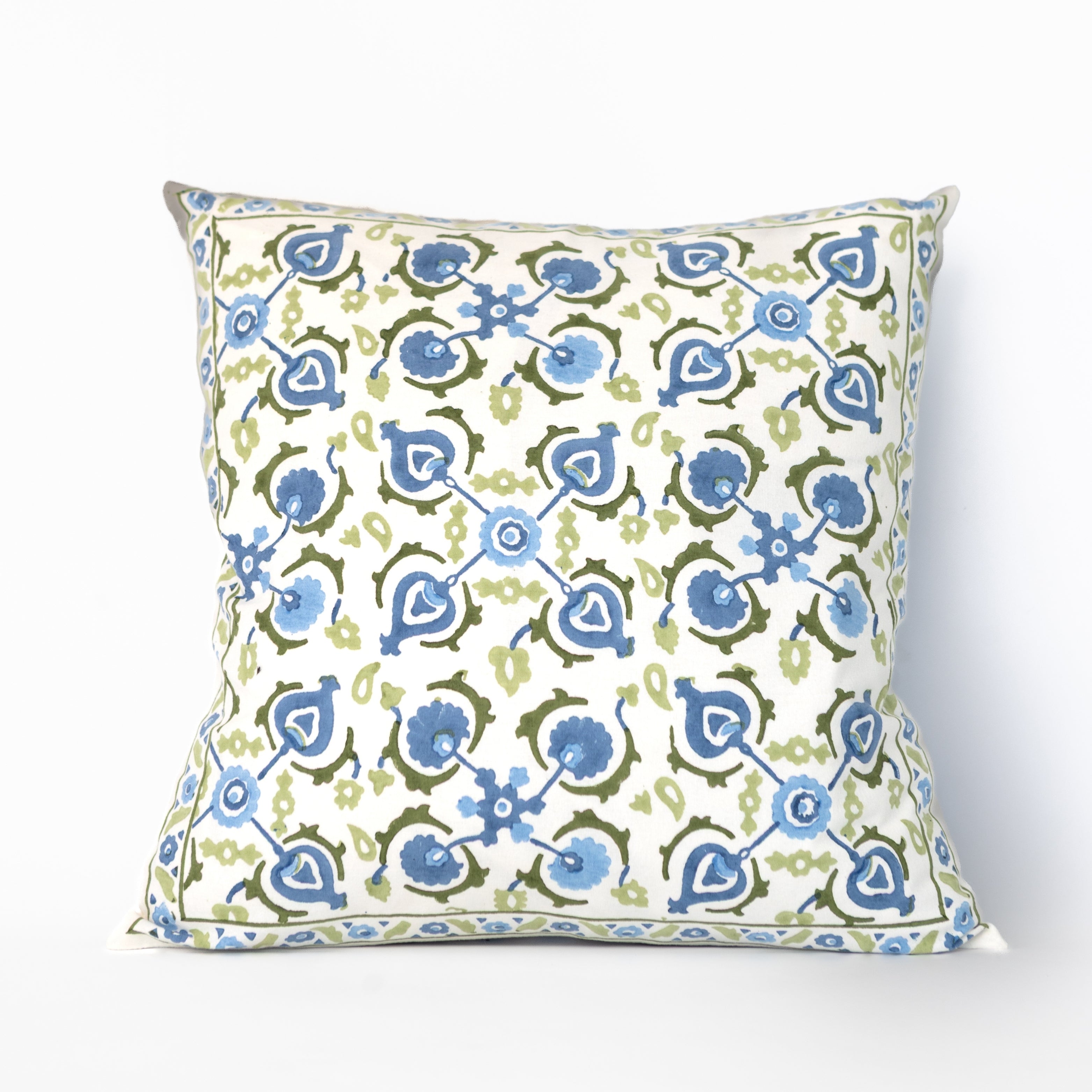 Decorative pillow with blue and green floral pattern on a white background