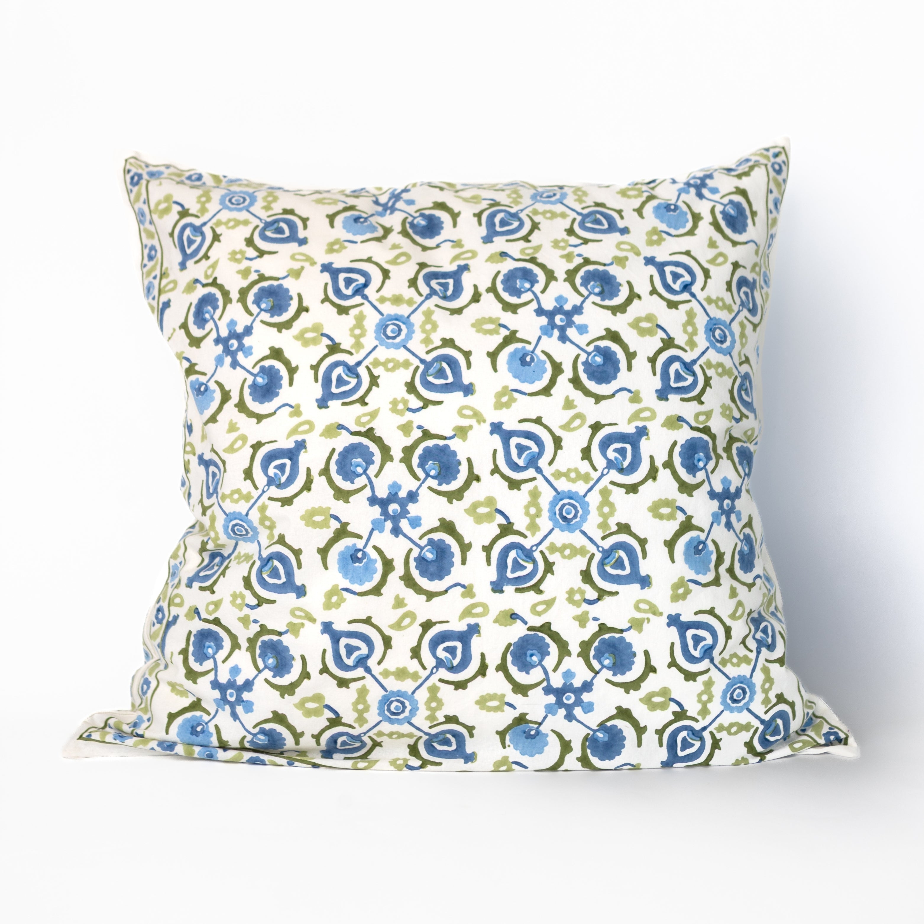 Decorative pillow with blue and green floral pattern on a white background