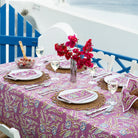 A lilac floral tablecloth and table setting