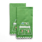Two green towels with pickleball design on a white background