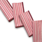 Set of red and white striped towels on a white background