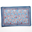 Blue and red patterned placemats on a white background