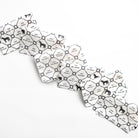 Arrangement of black and white napkins with horse patterns and text on a white background