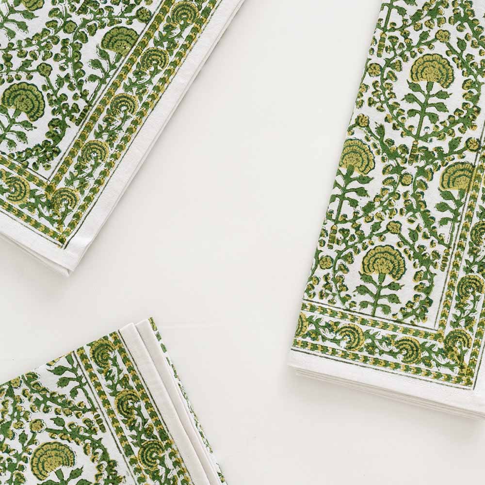 Intricate green and white detailing on 100% cotton napkins.
