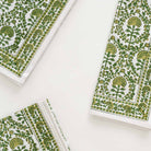 Intricate green and white detailing on 100% cotton napkins.