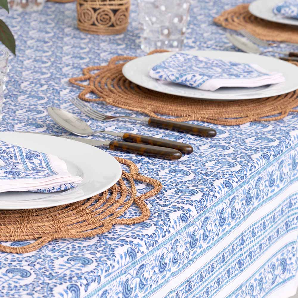 Tablecloth paired with matching napkins.
