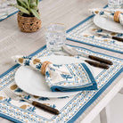 Close up of teal and gold floral details.