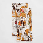 A set of two linen fingertip towels with a hand-sketched paddock scene including horses and people dressed in vintage attire.