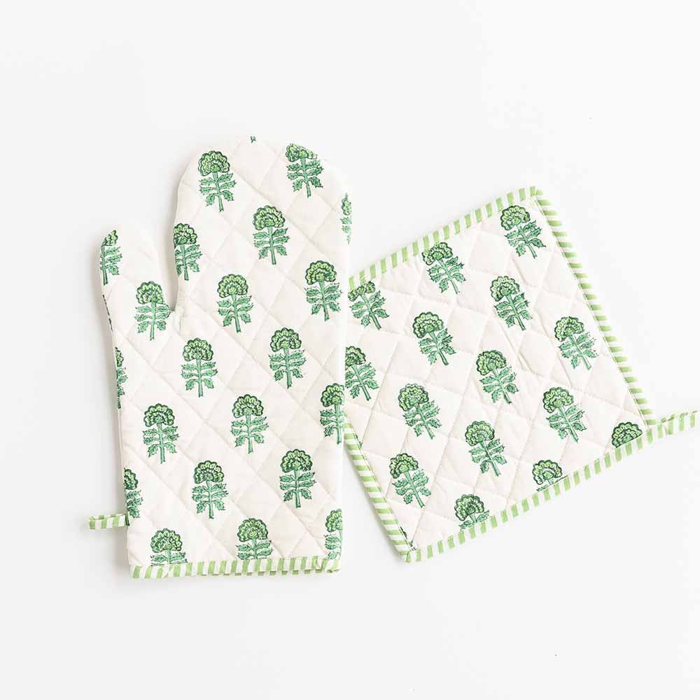 Green and white oven mitt set is edged with striped trim.