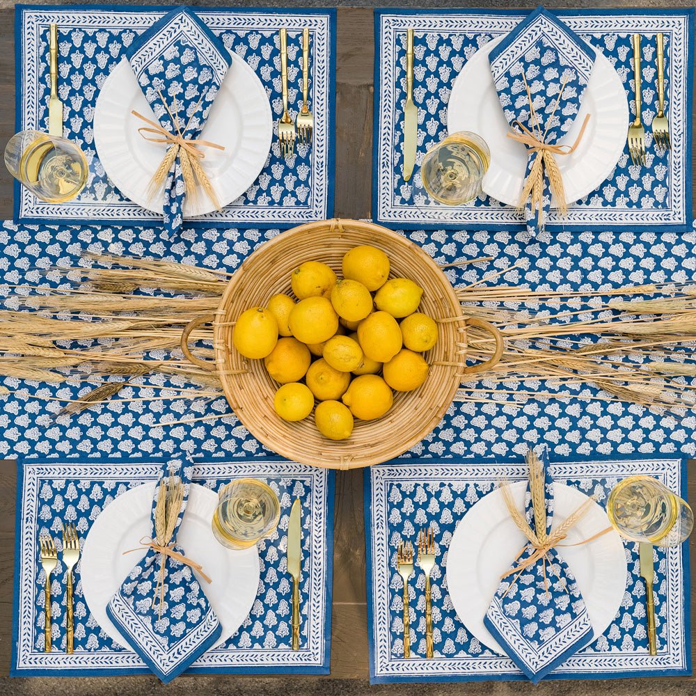Pom Buti Denim Floral blue & white placemat, table runner, and napkins